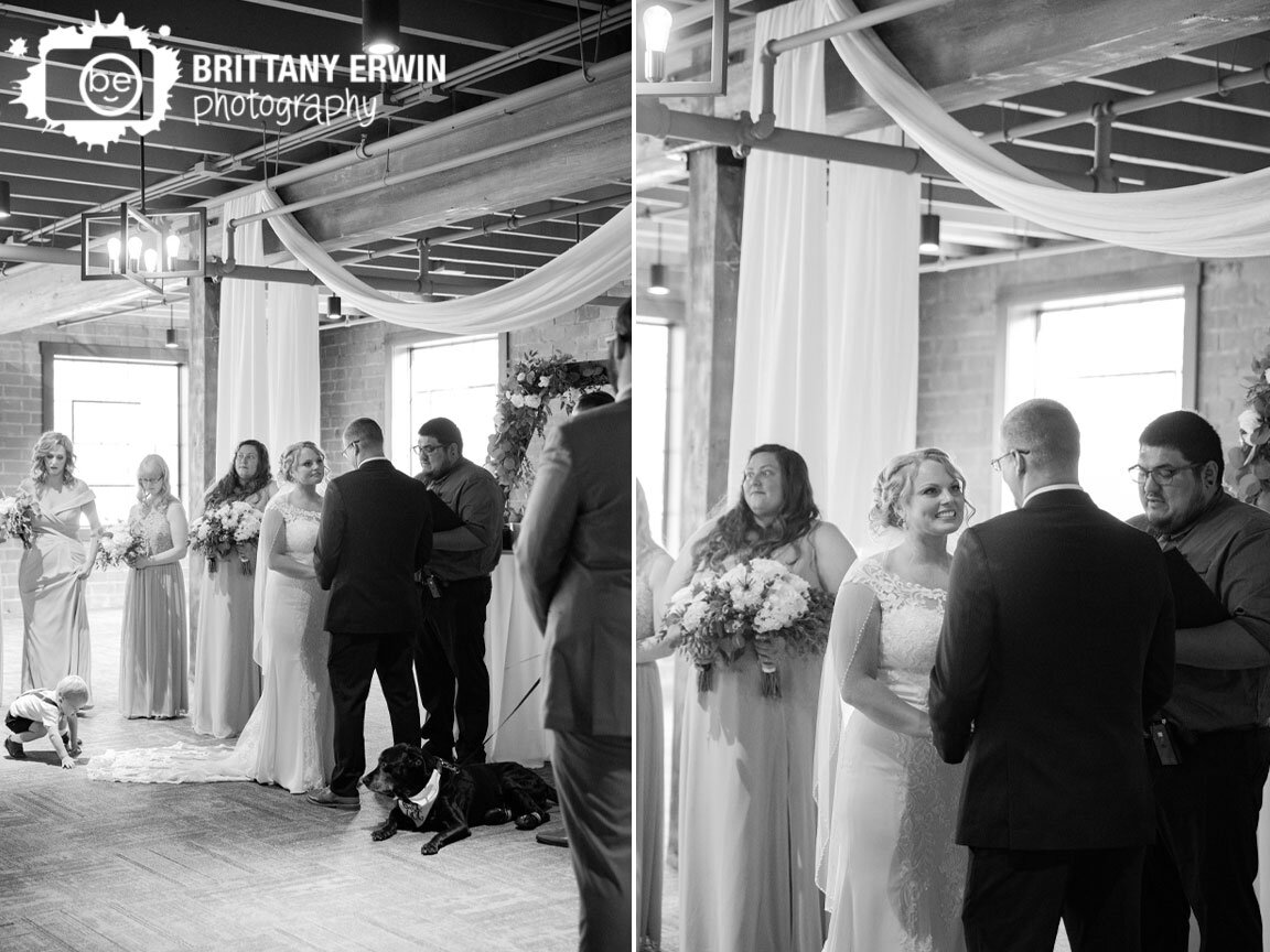 Franklin-Indiana-wedding-ceremony-photographer-couple-exchanging-vows-ring-bearer-playing-with-dress.jpg