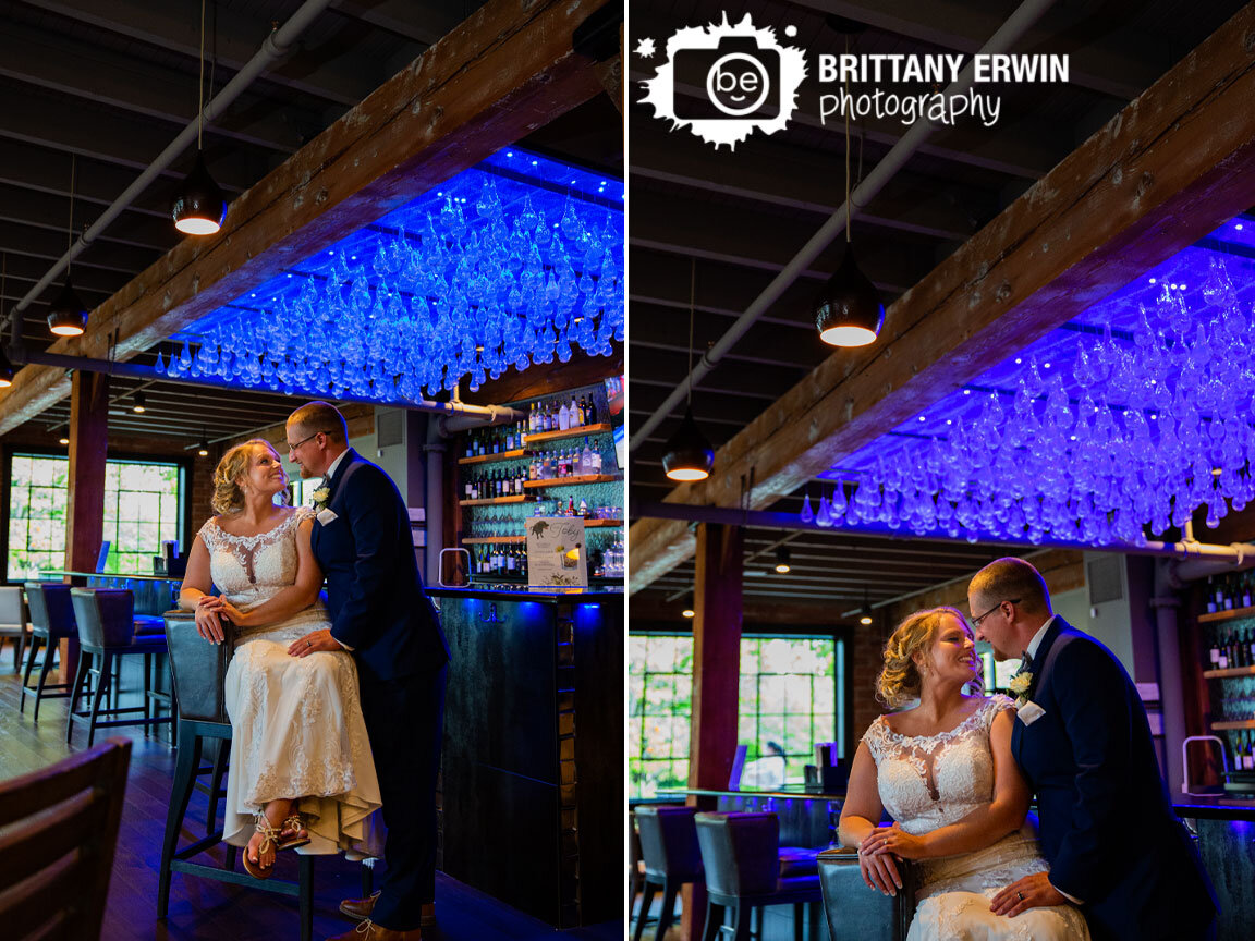 Garment-Factory-Events-venue-wedding-photographer-blue-lights-glass-ceiling-couple-at-bar.jpg