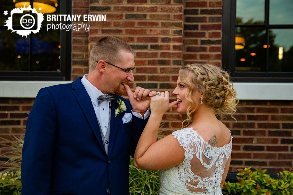 Franklin-Indiana-wedding-photographer-garment-factory-couple-pinkie-promise.jpg