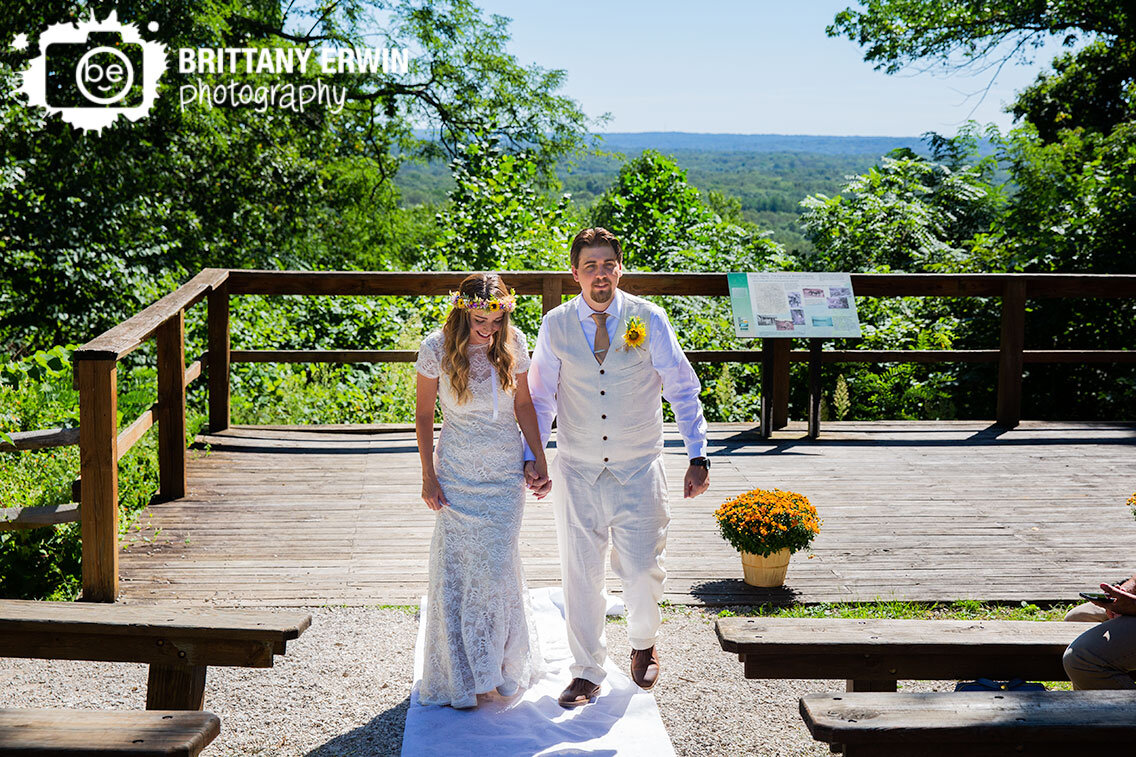 couple-announced-as-husband-and-wife-walk-down-aisle-outdoor-elopement.jpg