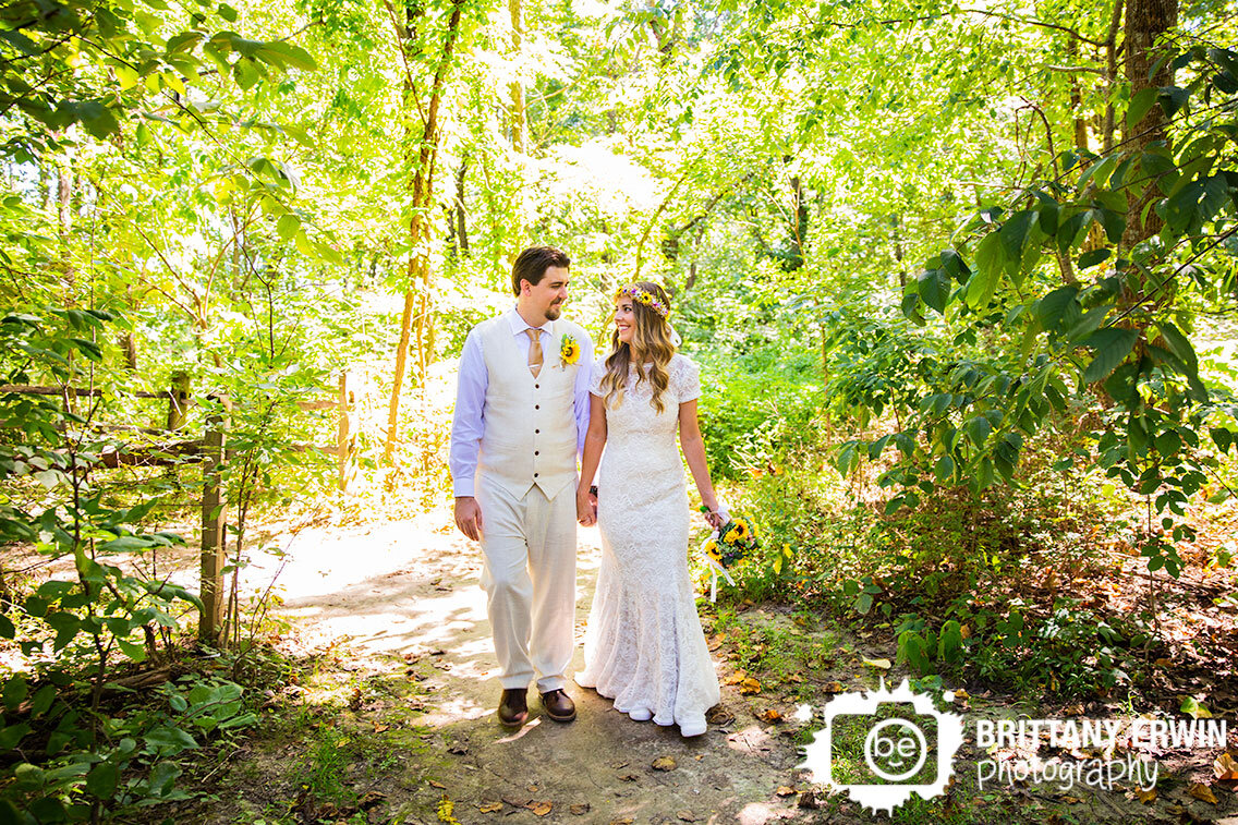 Brown-county-indiana-wedding-photographer-couple-on-tree-lined-path.jpg