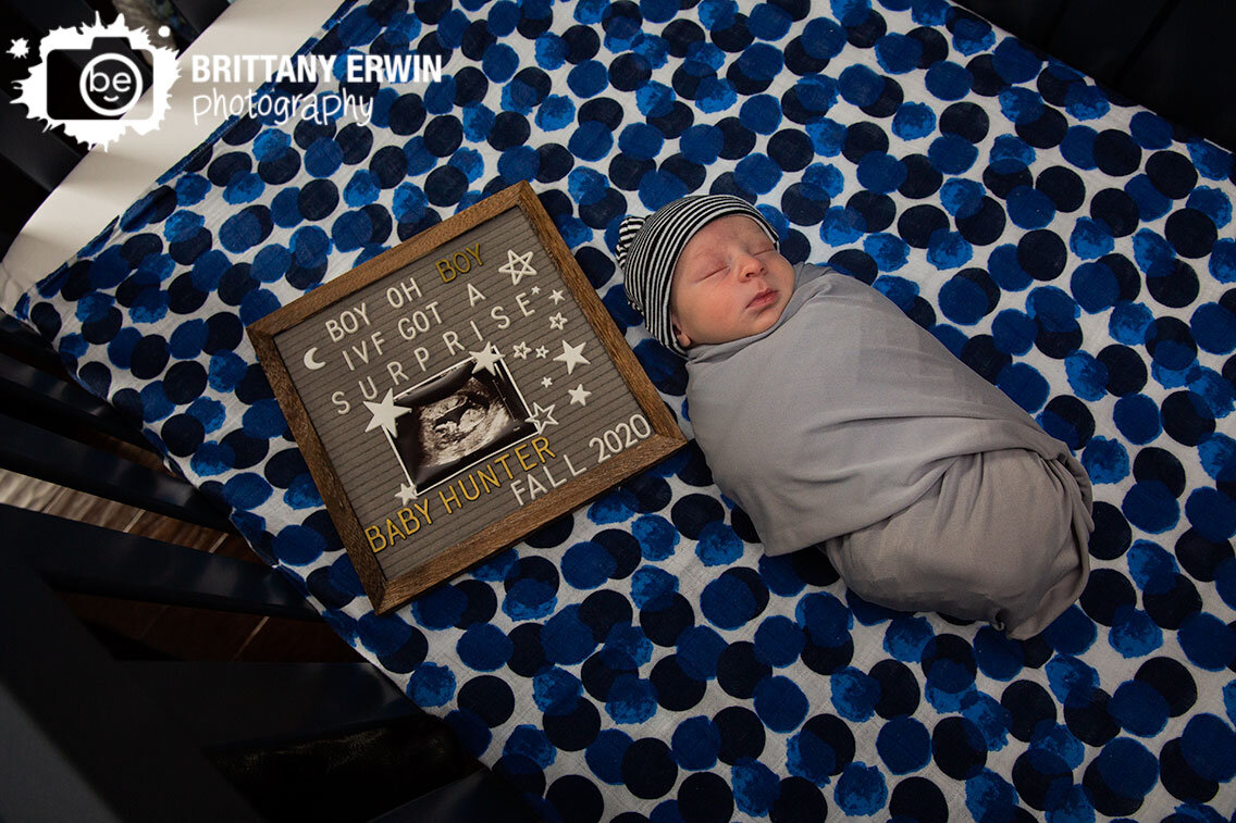 swaddled-sleeping-newborn-boy-blue-dot-blanket-letterboard-sign.jpg