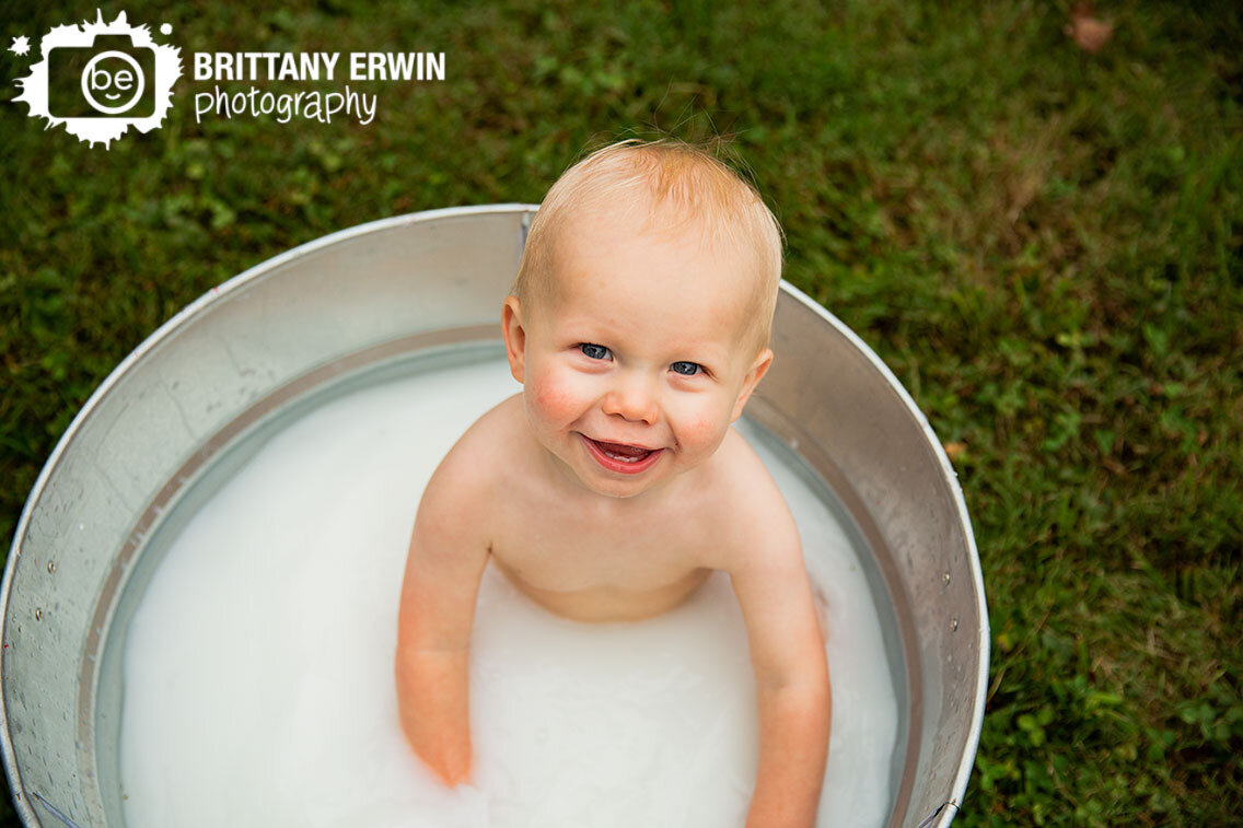baby-boy-milk-bath-outdoor-first-birthday-portrait-photographer.jpg