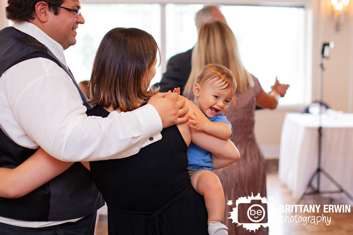 baby-boy-laughing-at-wedding-reception-on-dance-floor.jpg