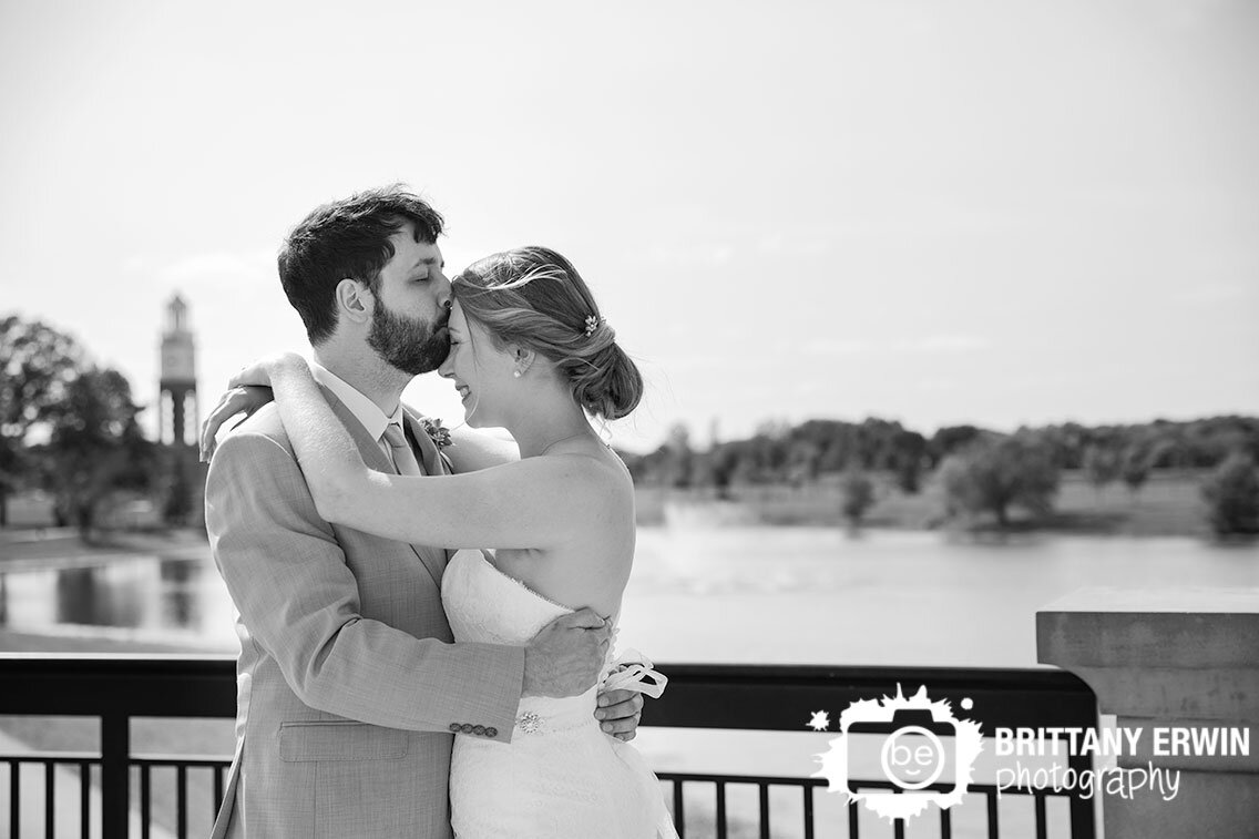 Indianapolis-wedding-photographer-couple-on-bridge-forehead-kiss.jpg
