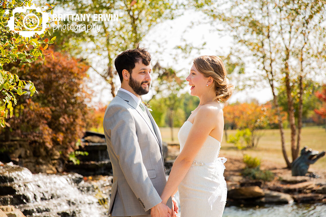 Indianapolis-wedding-photographer-couple-at-waterfall-in-Coxhall-Gardens.jpg