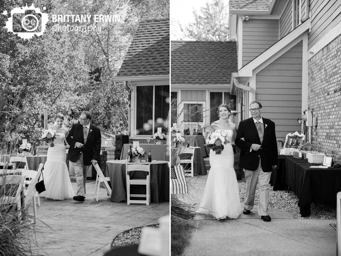 bride-walking-down-aisle-at-wedding-ceremony-with-father.jpg