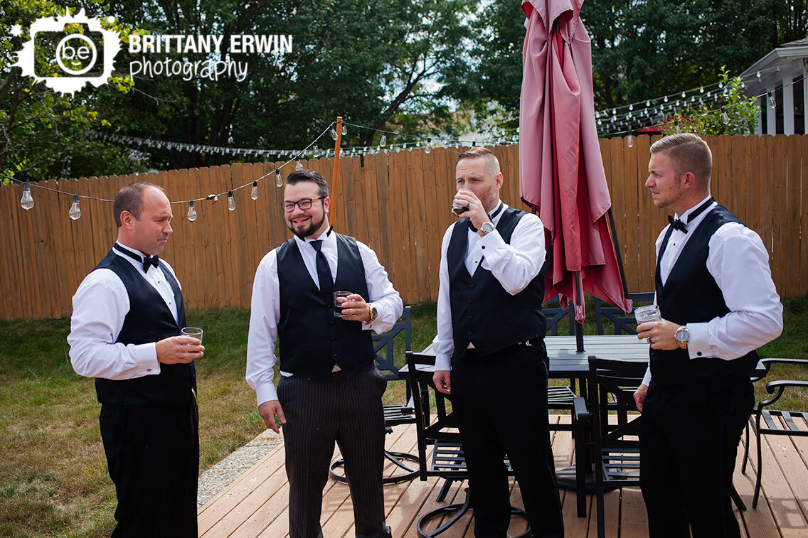 groom-groomsmen-toast-outside-getting-ready.jpg