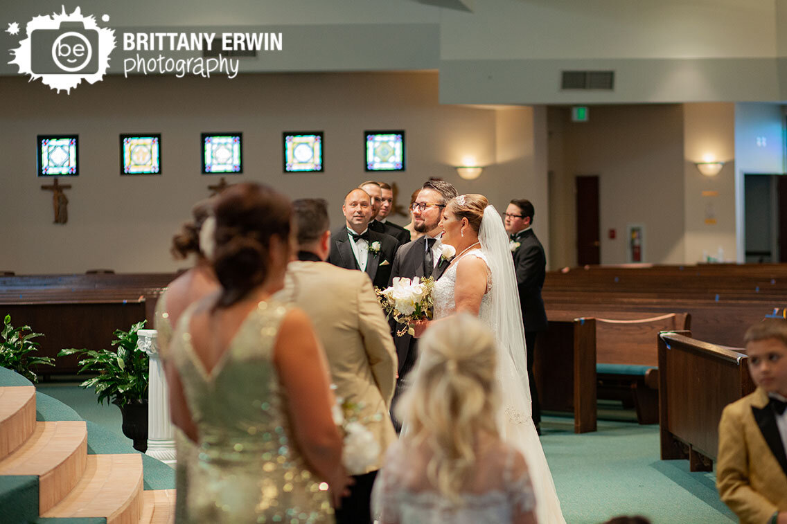 Our-lady-of-greenwood-wedding-ceremony-bride-groom-at-altar.jpg