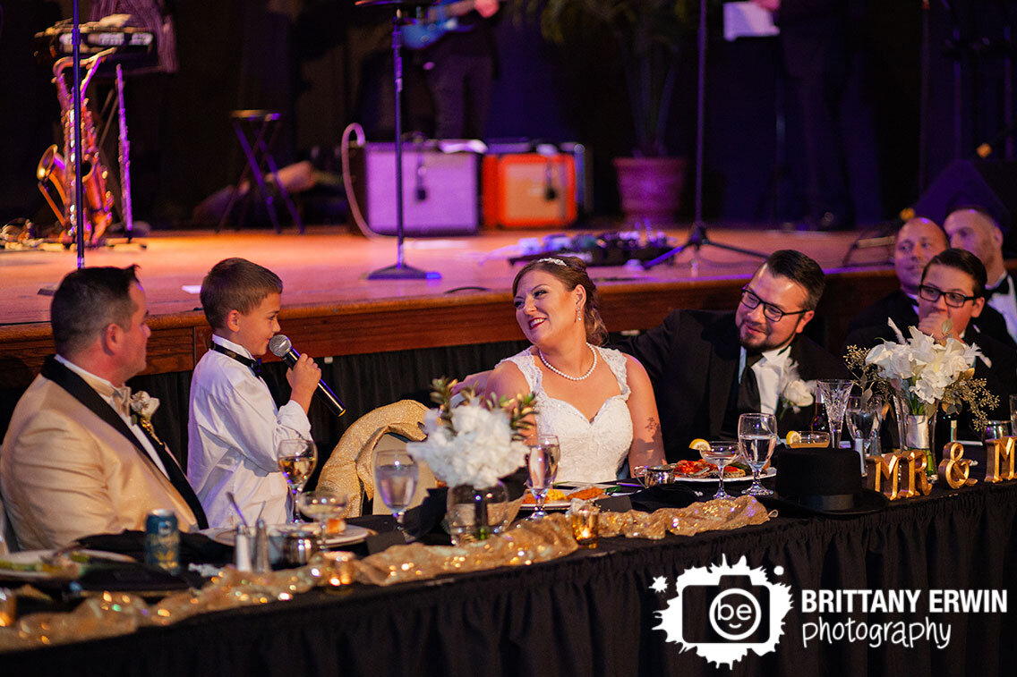Fountain-Square-Theatre-wedding-party-head-table-toast-by-son-of-bride.jpg