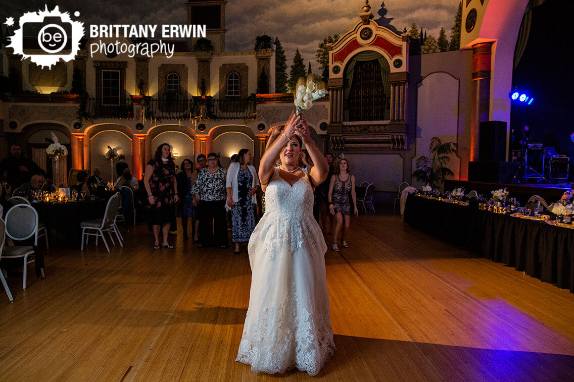 Indianapolis-wedding-reception-photographer-bride-throwing-bouquet.jpg