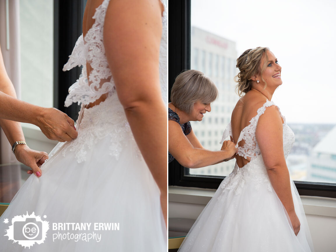 bride-getting-ready-mother-zipping-up-dress.jpg