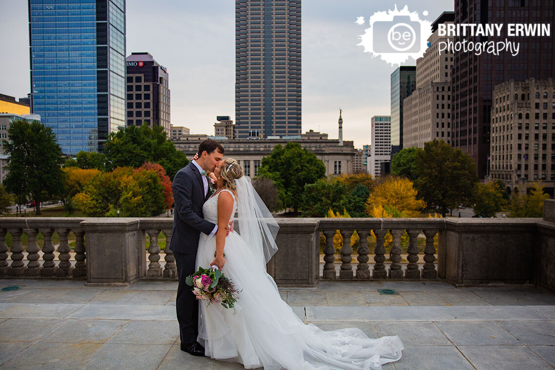 Downtown-Indianapolis-wedding-photographer-bridal-portrait-couple-on-war-memorial.jpg