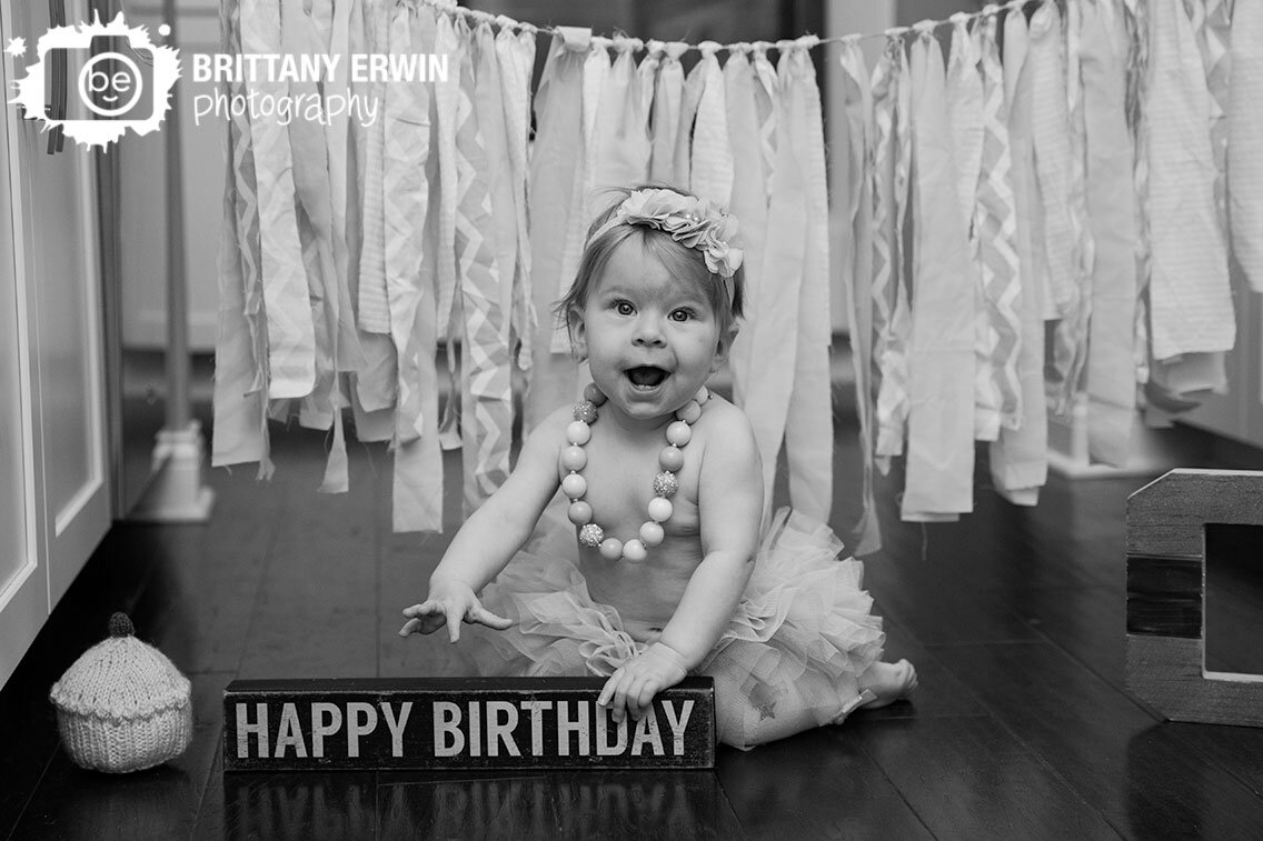 In-home-lifestyle-happy-birthday-girl-photographer-cupcake-session-in-kitchen.jpg