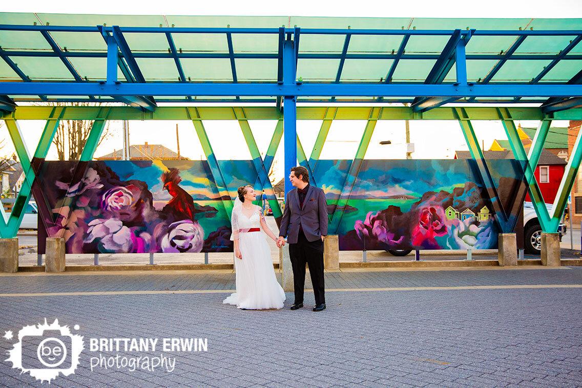 Fountain-Square-Indiana-wedding-photographer-couple-with-mural-sunset-portrait.jpg