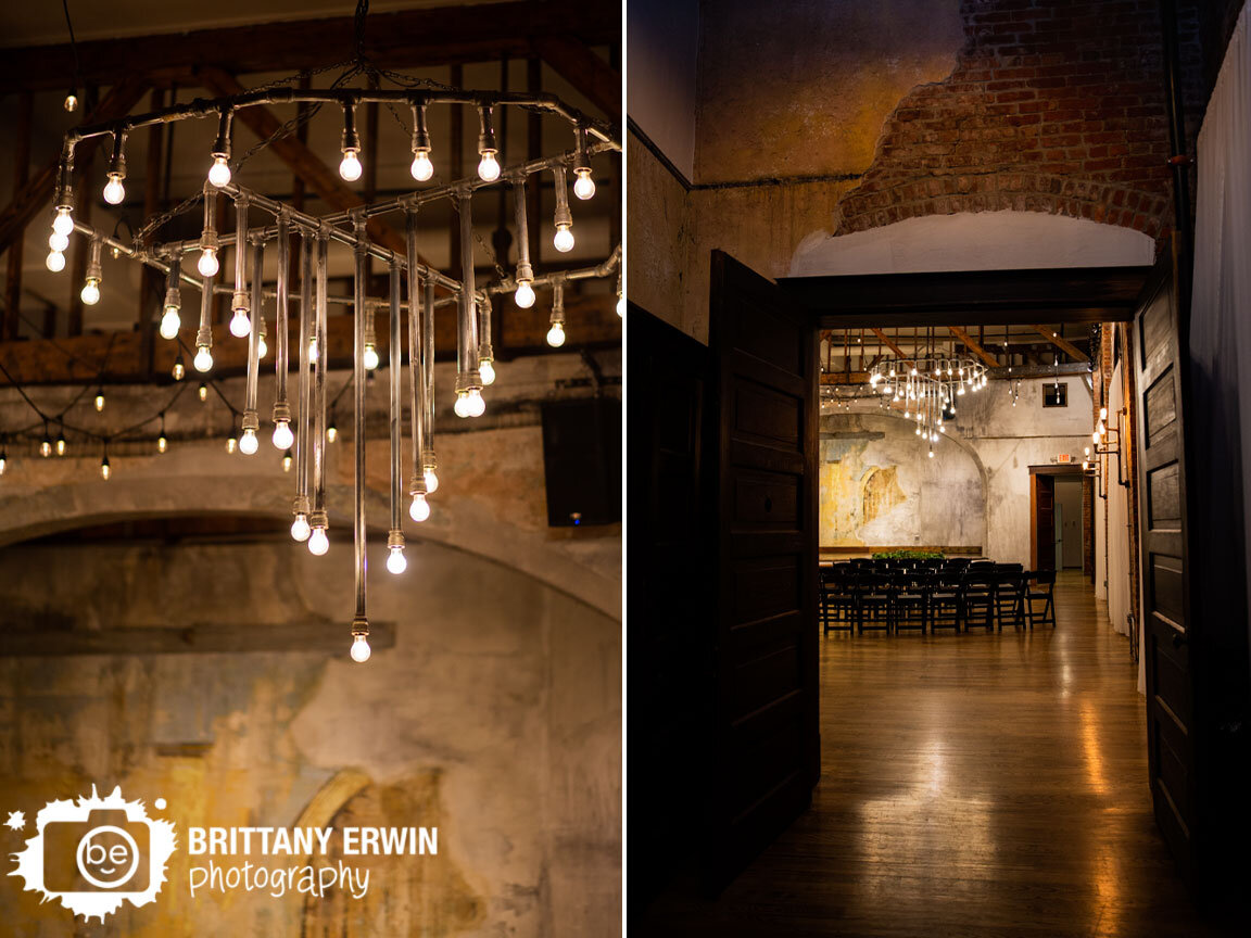Indianapolis-wedding-photographer-Neidhammer-events-space-insdustrial-lighting-chandeliere-with-stage.jpg