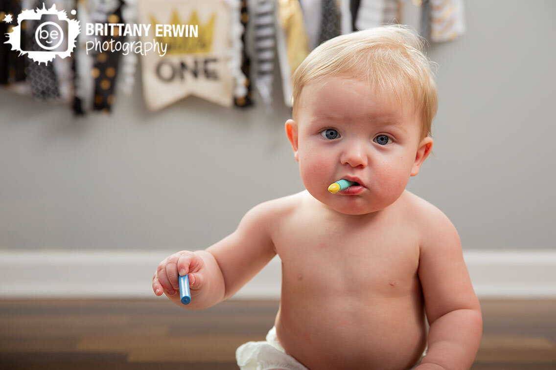 Indianapolis-portrait-photographer-baby-boy-first-birthday-toy-candles.jpg