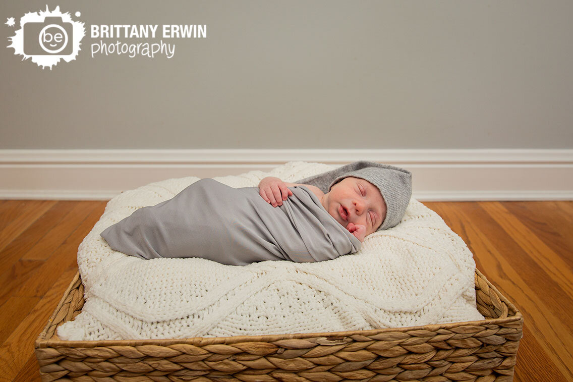 Indianapolis-newborn-portrait-photographer-sleeping-boy-in-basket-lifestyle-session.jpg