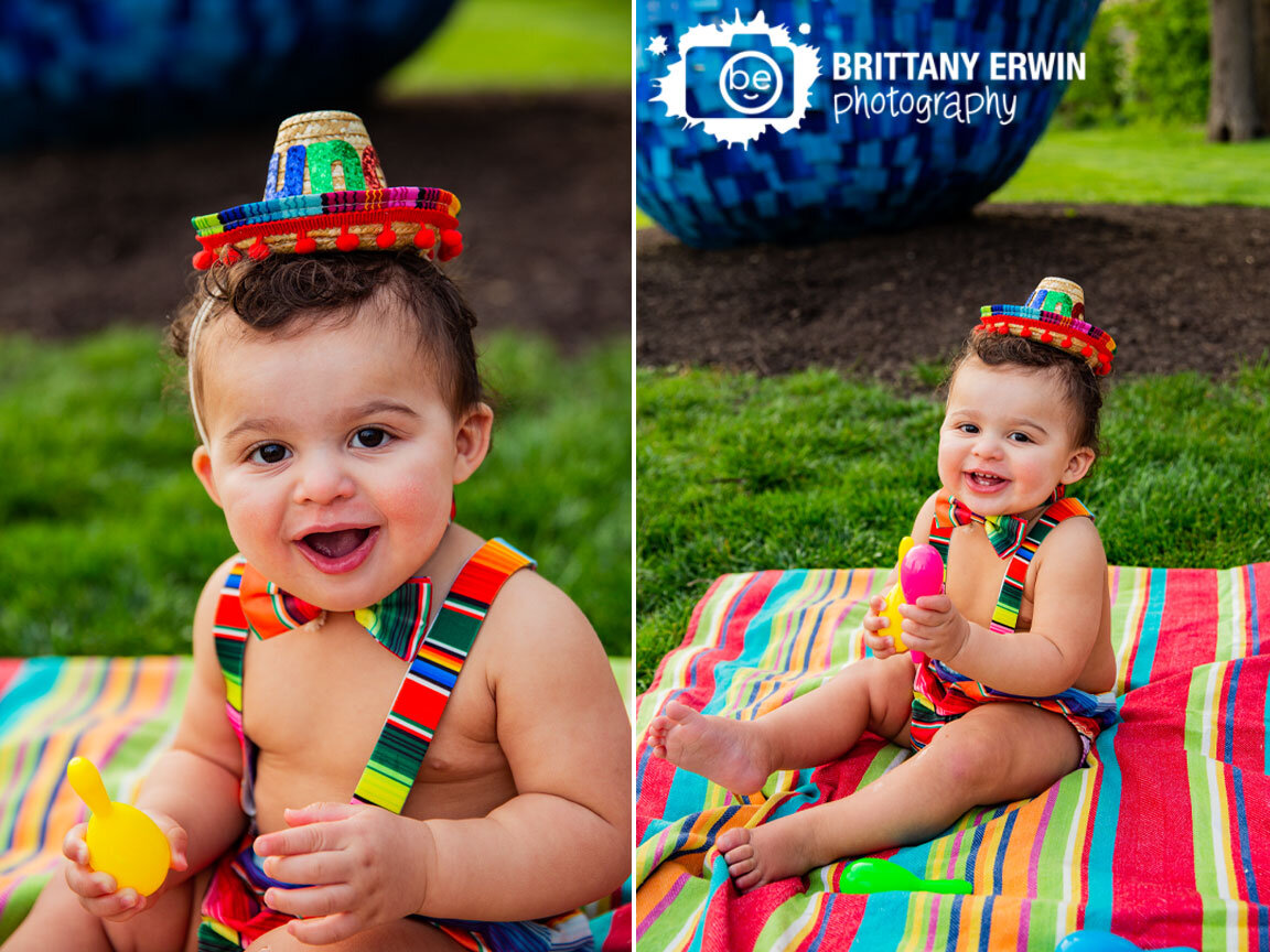 first-birthday-portrait-photographer-maraca-baby-boy-playing-on-fiesta-blanket-with-bow-tie.jpg