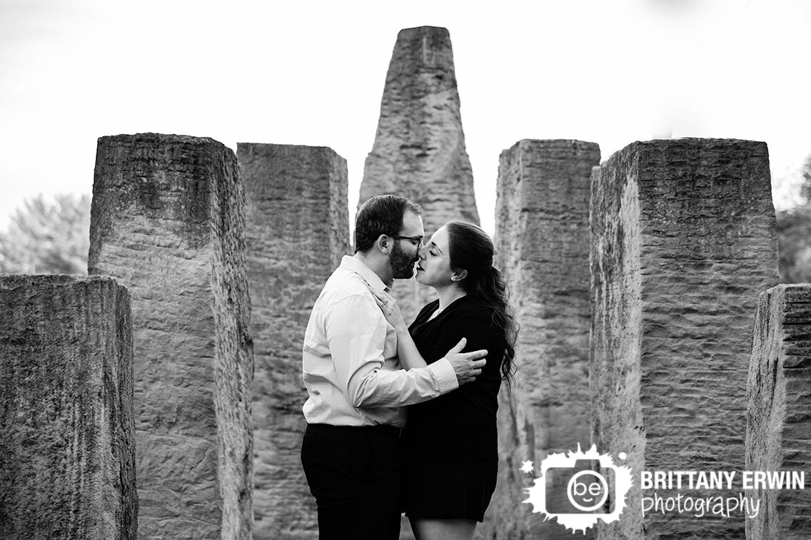 Indianapolis-Art-Center-couple-with-stone-sculpture-outdoor-engagement-portrait-photographer.jpg