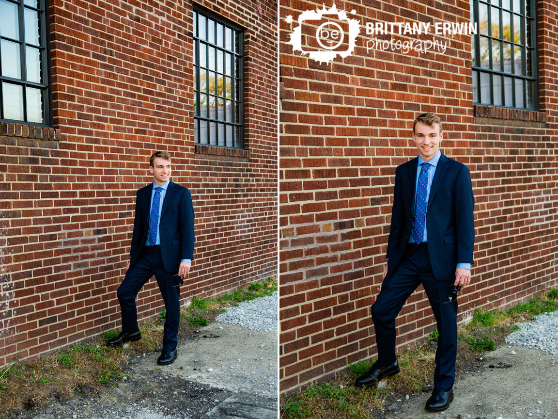 Fountain-Square-senior-portrait-photographer-suit-with-brick-wall.jpg
