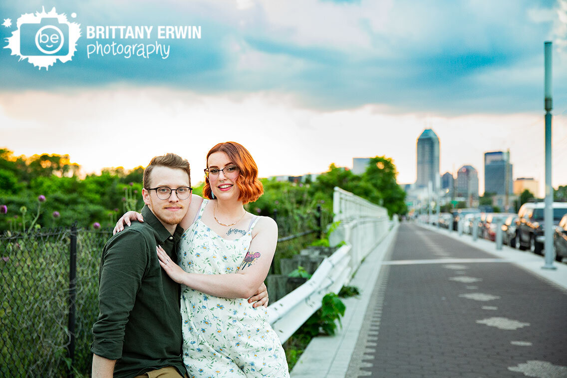 Downtown-Indianapolis-skyline-from-Fountain-Square-walking-path-couple-engagement-portrait.jpg