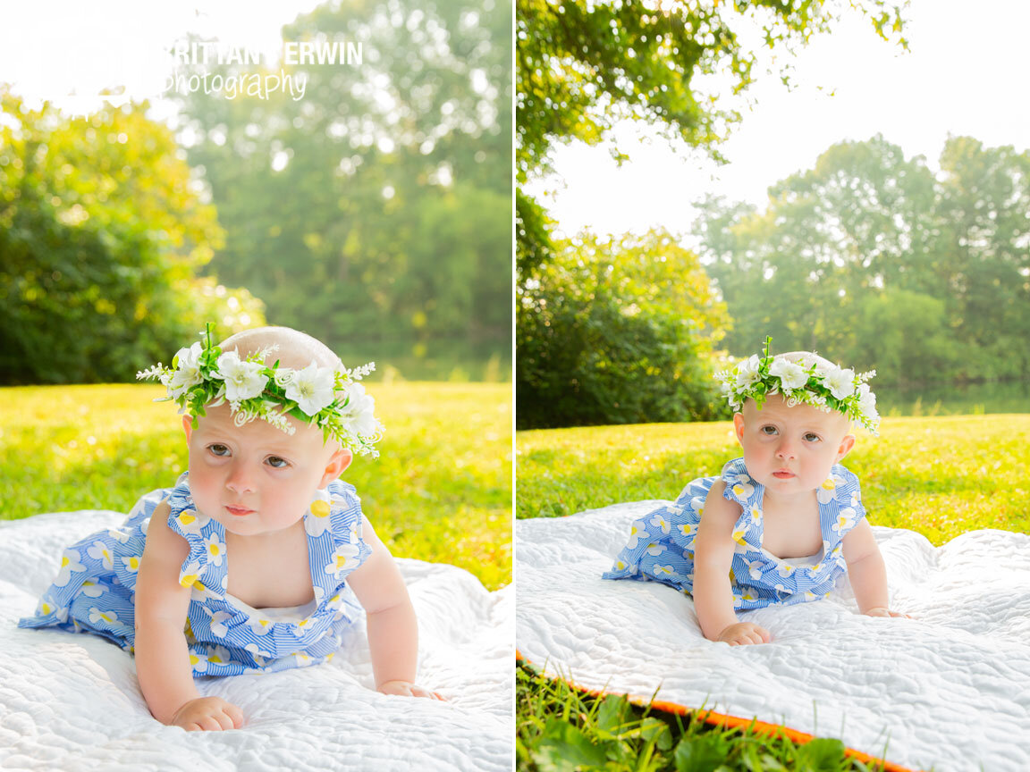 Indianapolis-milestone-portrait-photographer-baby-girl-flower-dress-on-white-quilt.jpg