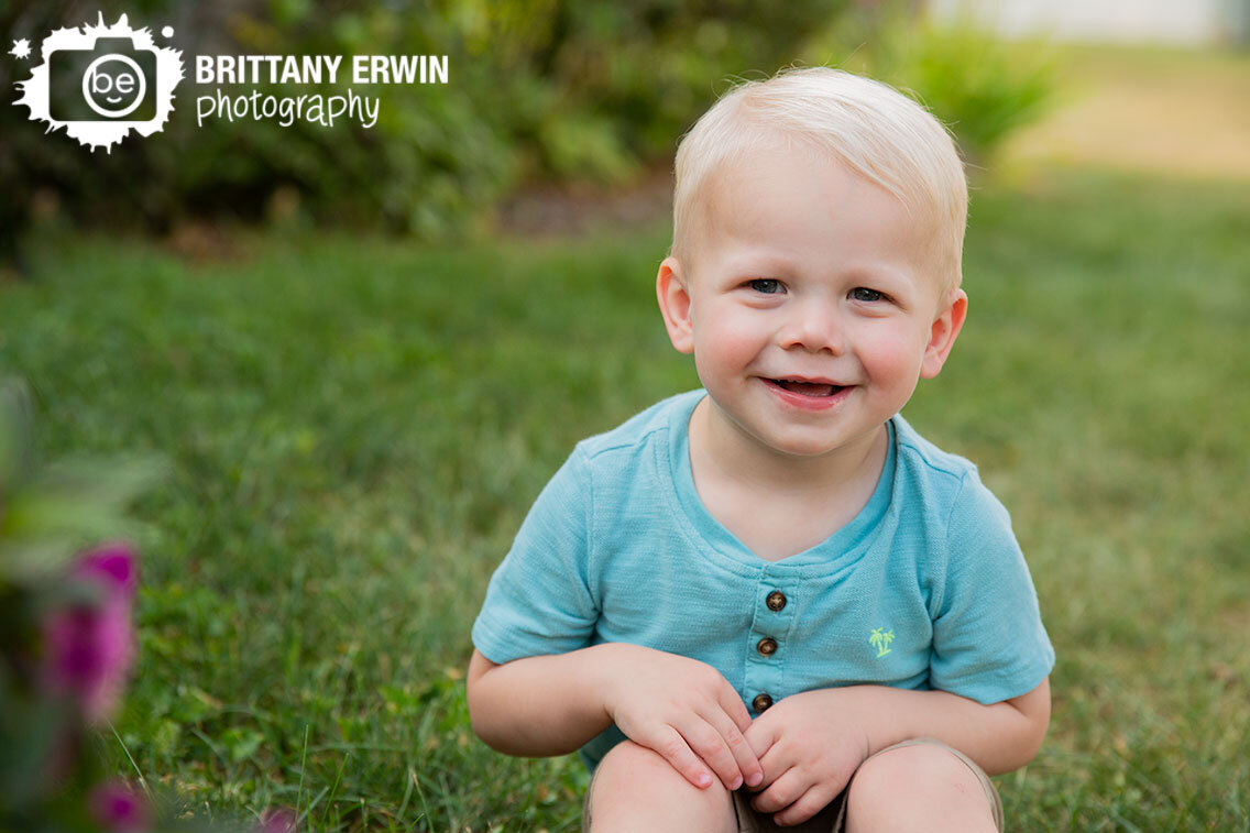 Indianapolis-portrait-photographer-toddler-boy-sitting-outside-in-grass-summer-session.jpg