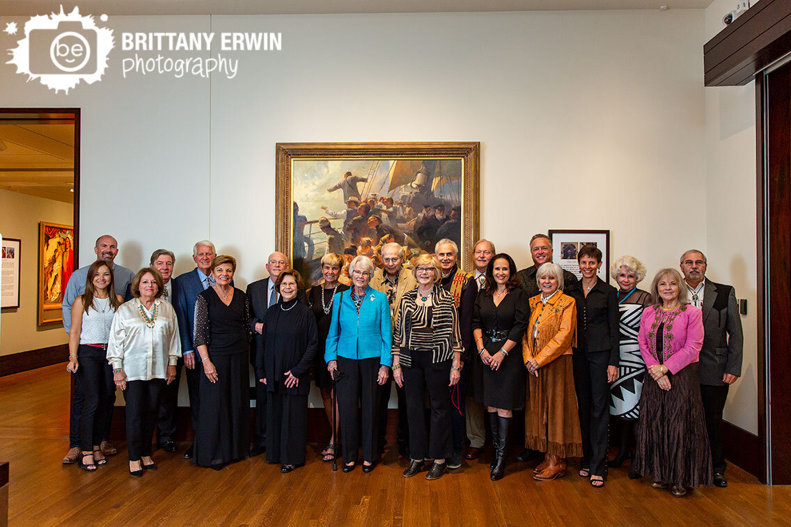 Indianapolis-event-photographer-Western-Art-Society-group-portrait-with-painting-at-Eiteljorg-Museum-of-Art.jpg
