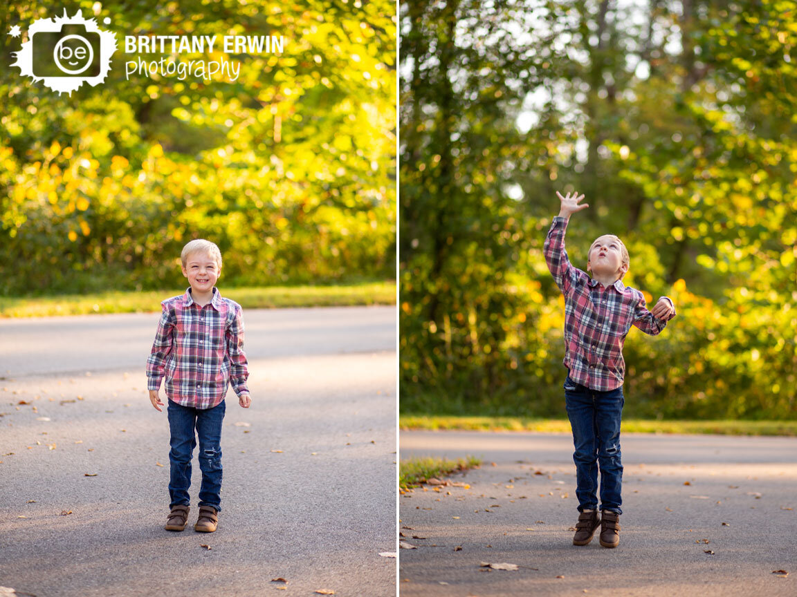 Indianapolis-portrait-photographer-boy-outside-fall-jumping-for-tree.jpg