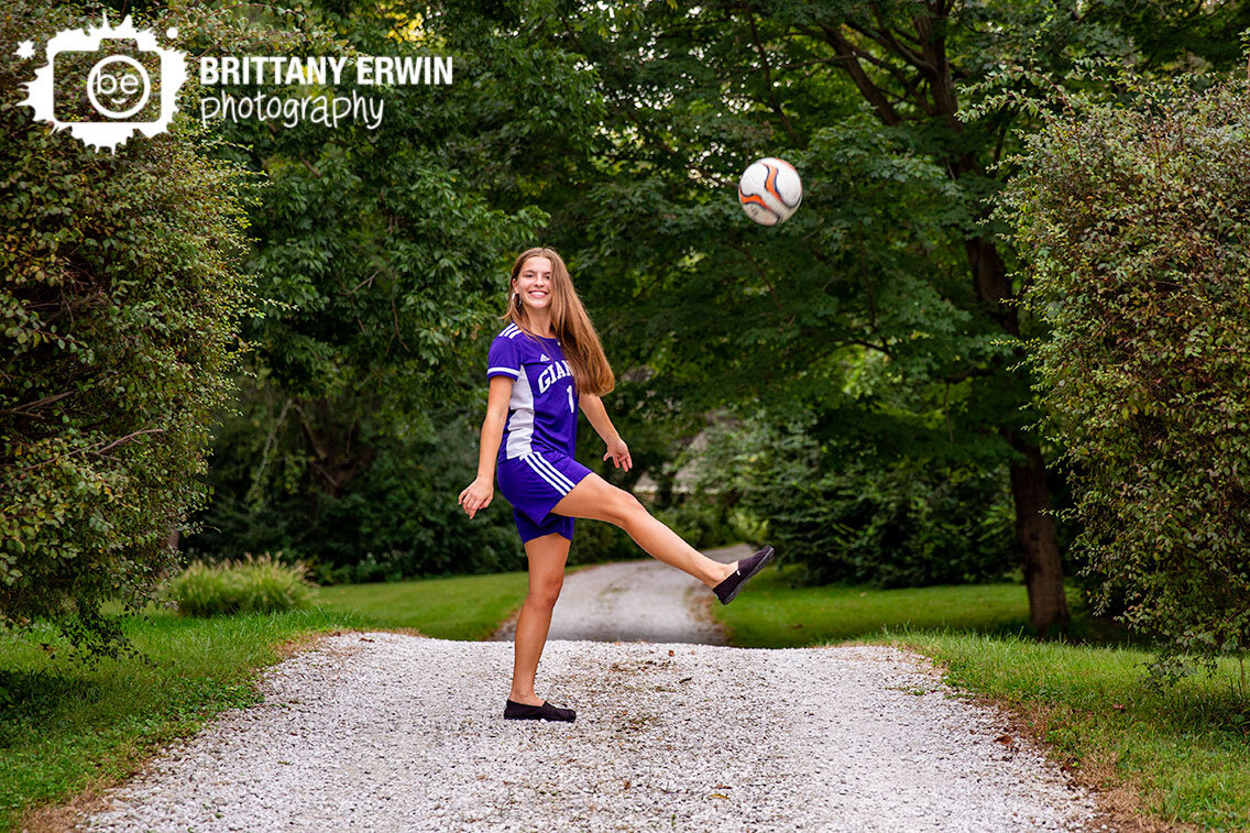 Indianapolis-portrait-photographer-high-school-senior-soccer-dribbling-ball-in-air.jpg