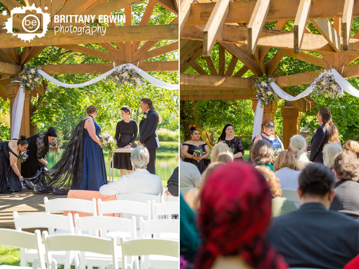 Outdoor-wedding-ceremony-bridesmaids-adjusting-bridal-cape-at-altar.jpg