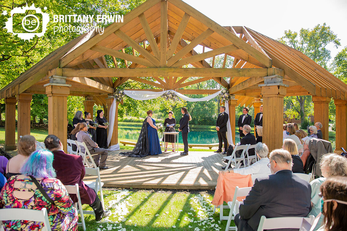 Indianapolis-outdoor-wedding-ceremony-under-pergola-next-to-lake.jpg