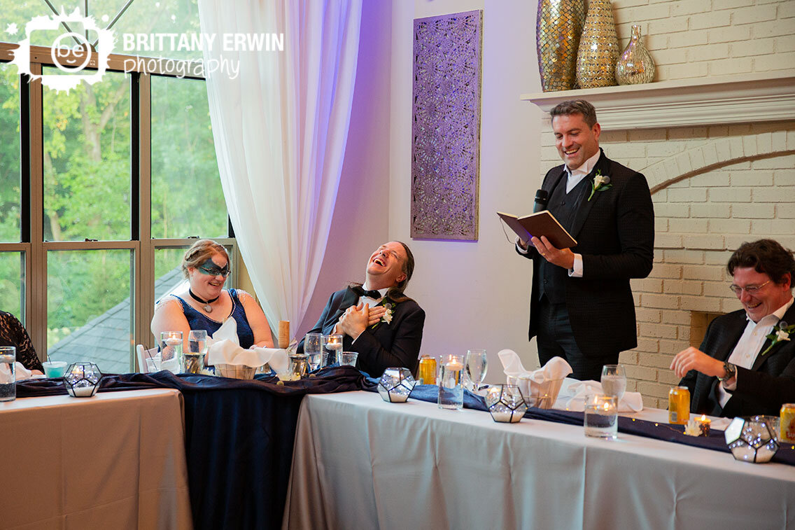 Indianapolis-wedding-photographer-groom-laughing-during-best-man-speech.jpg
