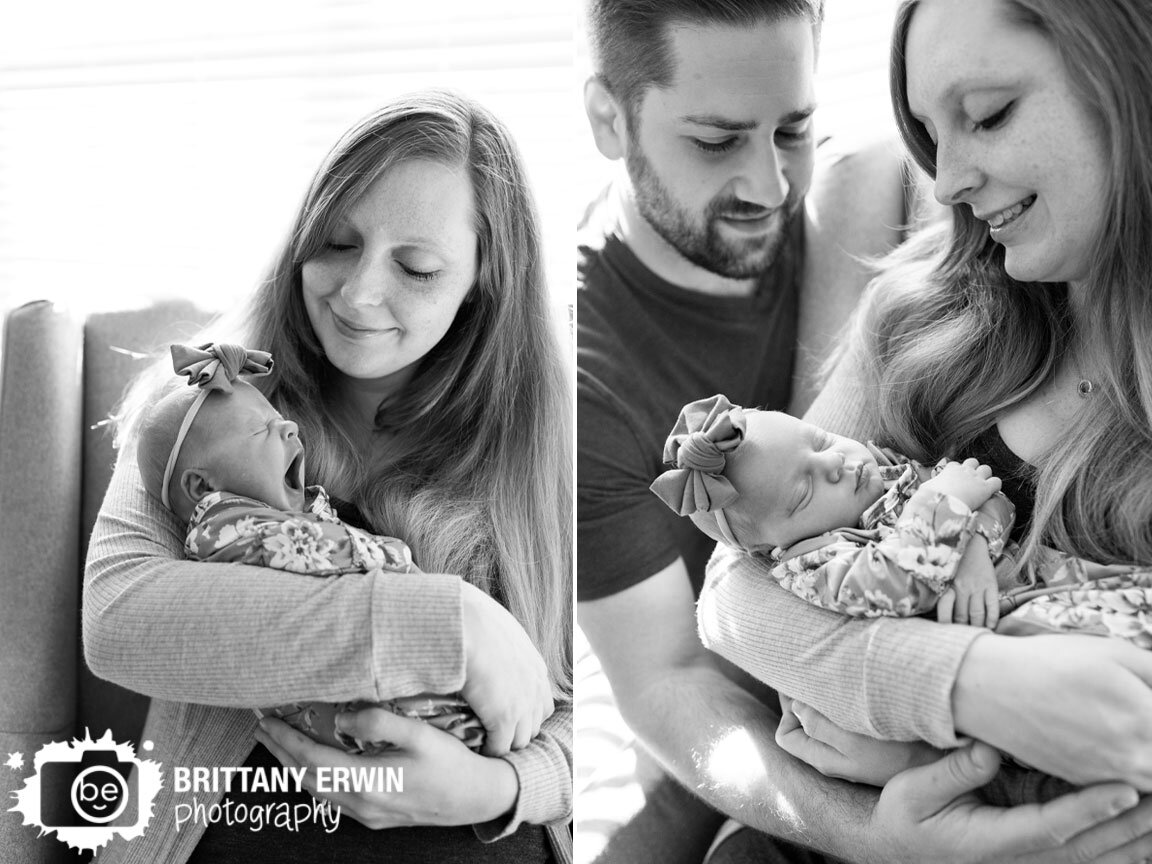 Indianapolis-newborn-portrait-photographer-yawning-baby-girl-held-by-mother.jpg