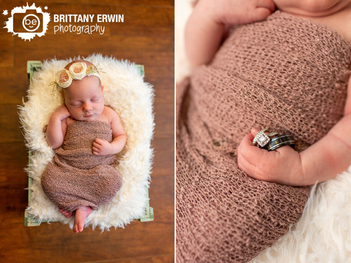 in-home-newborn-portrait-photographer-sleeping-baby-girl-holding-wedding-rings.jpg