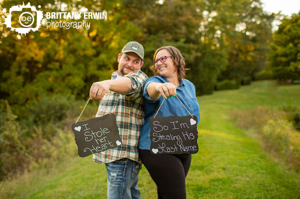 chalk-board-signs-i-stole-her-heart-so-im-stealing-his-last-name.jpg