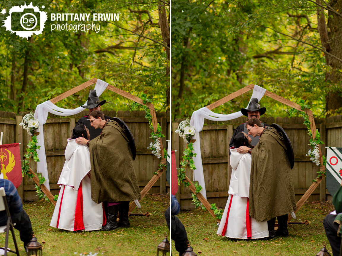 bride-and-groom-first-kiss-outdoor-ceremony-hobbit-backyard-Lord-of-the-Rings.jpg