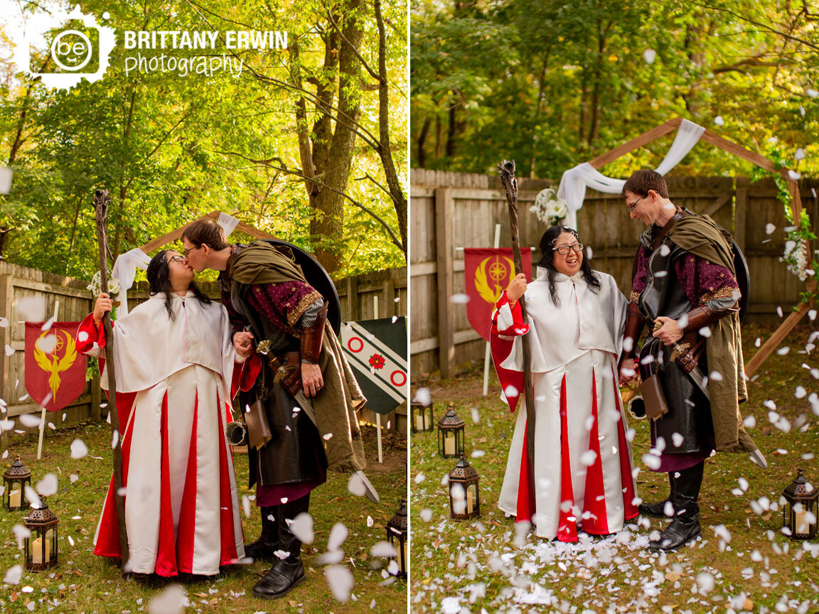 Nerdy-wedding-photographer-throwing-heart-shaped-paper-confetti-couple-outside.jpg