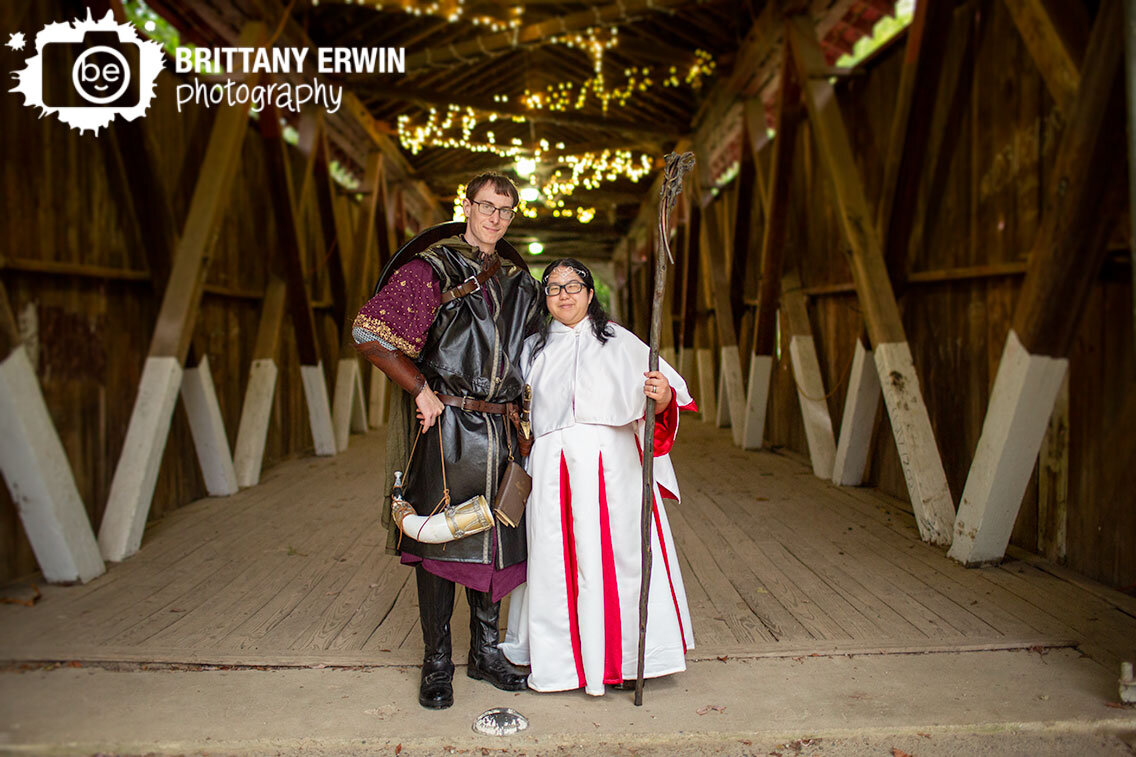 Lord-of-the-Rings-themed-wedding-LotR-couple-with-gandalf-sword-paladin-outfit.jpg