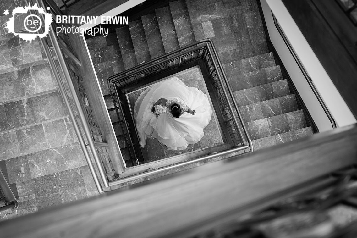 bride-twirling-at-bottom-of-stairs-at-Community-Life-Center.jpg