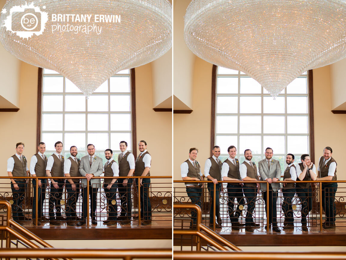 groom-and-groomsmen-in-tower-at-Community-Life-Center-with-chandeliere.jpg