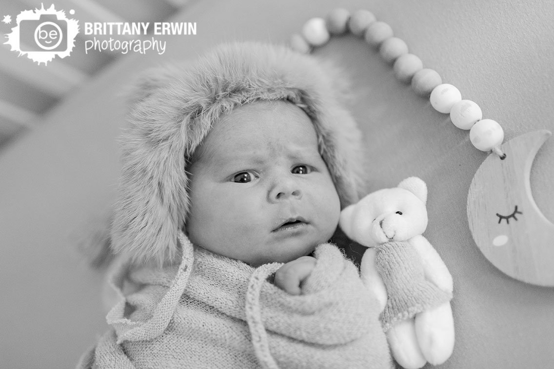 Indianapolis-lifestyle-newborn-photographer-teddy-bear-hat-stuffy-with-bead-rope.jpg