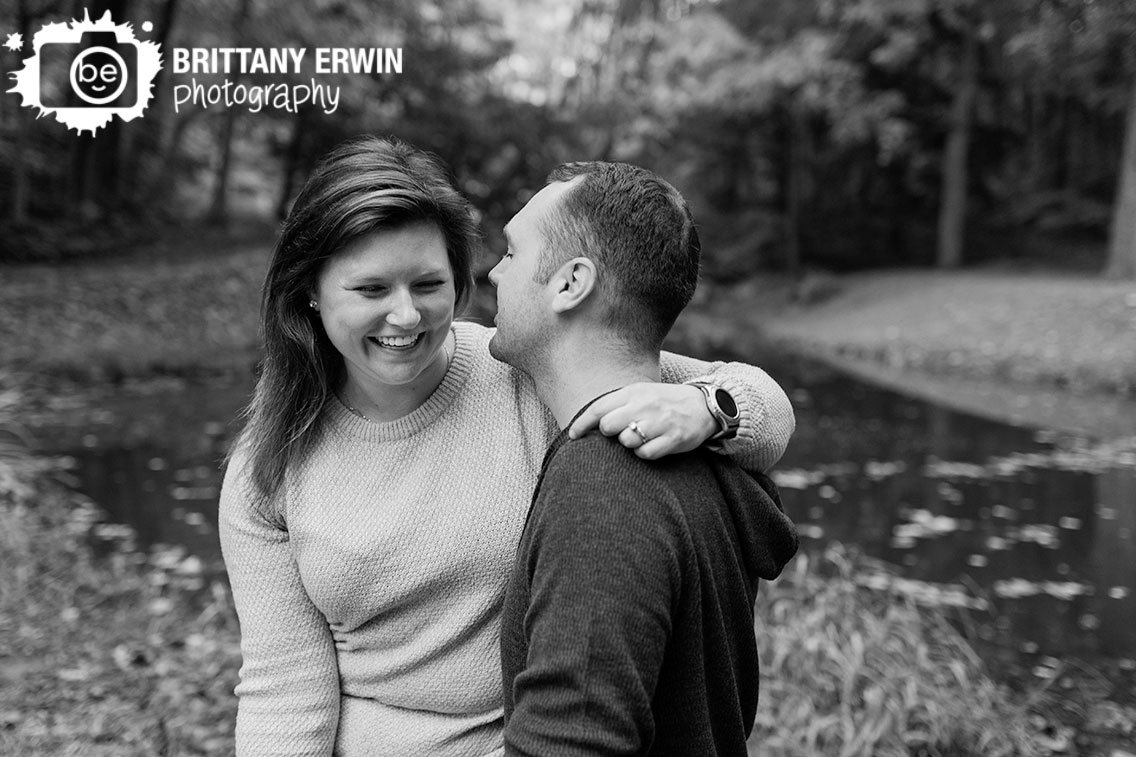 couple-outdoor-fall-portrait-photographer-by-pond-at-Holcomb-Gardens.jpg