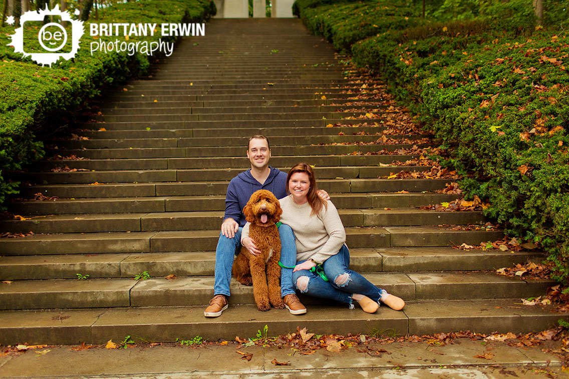 couple-with-pet-dog-on-staircase-outside-fall-portrait-photographer.jpg