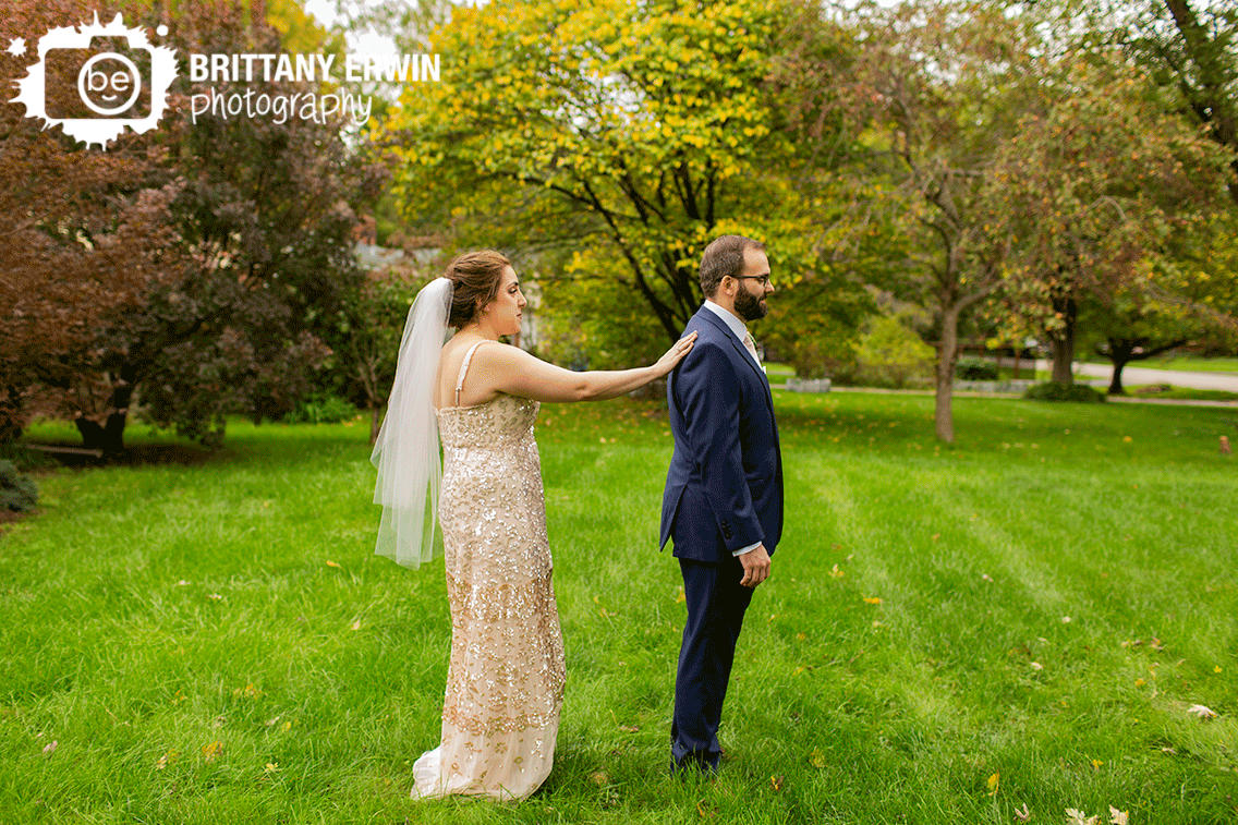 Indianapolis-wedding-photographer-bride-tapping-groom-on-shoulder-first-look-outside-reveal-fall.gif