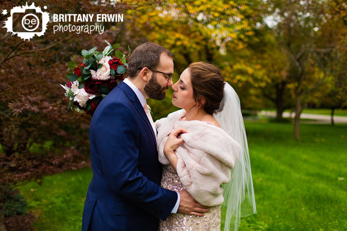 Indianapolis-front-yard-fall-colorful-leaves-couple-bridal-portrait.jpg