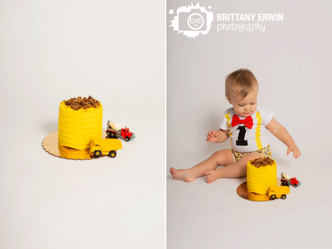 Indianapolis-cake-smash-studio-portrait-photographer-yellow-cake-with-cookie-topping-construction-theme.gif