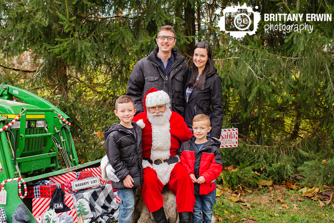 family-portrait-with-santa-kids-outside-country-christmas-naughty-list-tractor.gif