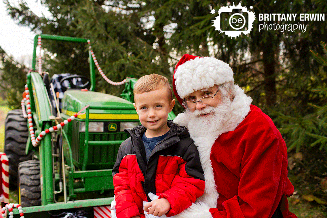 Indianapolis-Christmas-mini-session-portrait-photographer-boy-with-santa-outside-with-tractor.gif